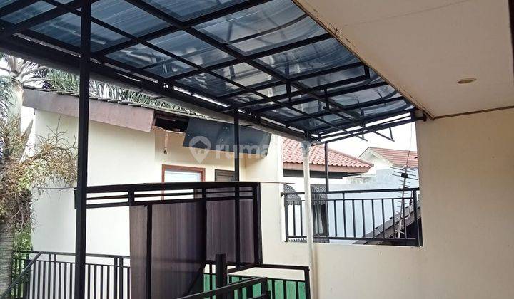 Rumah semifurnish  2lantai siap huni hadap barat di kencana loka 2