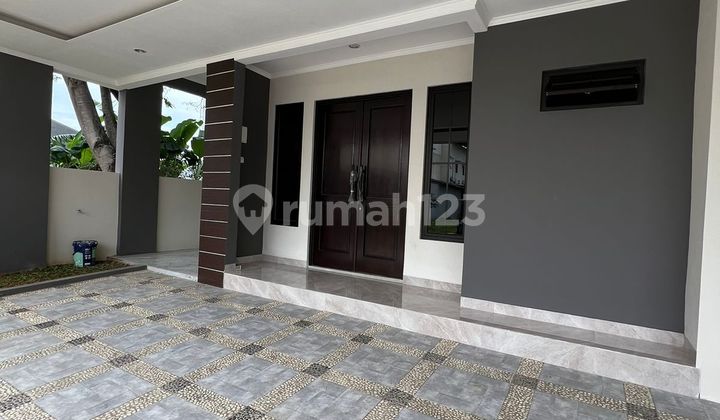 Rumah modern kekinian hoek taman kokoh hadap tenggara di The icon Rumah modern kekinian hoek taman kokoh hadap tenggara di The icon