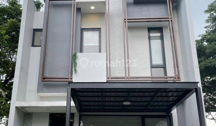 Rumah minimalis modern lebar 7 di Yuthica bsd city 2