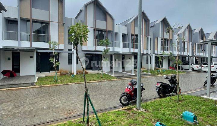 Rumah minimalis modern lebar 7 di Yuthica bsd city 1