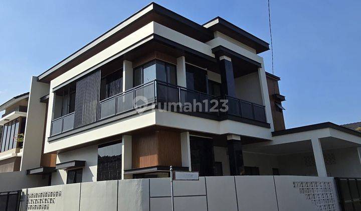 Rumah 2lantai hoek dgn design modern mewah kekinian diGriya loka  1