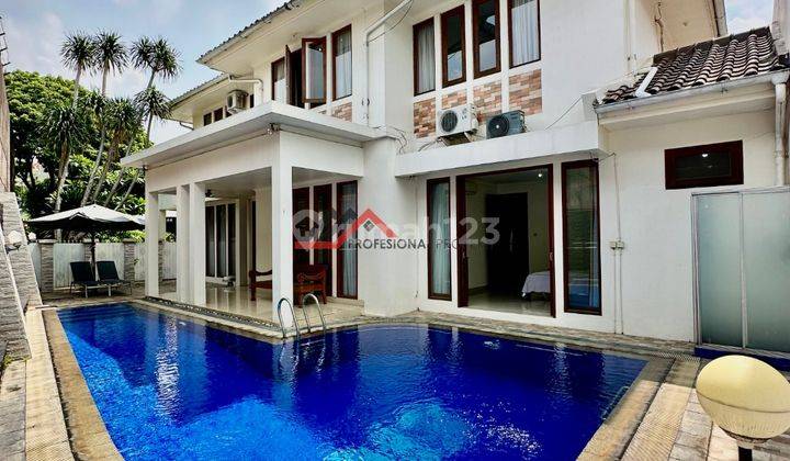 Rumah Dalam Komplek Kemang Bergaya Tropical Minimalis Bebas Banjir 2