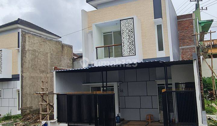 Rumah 2 lantai dekat SHM depqn taman bunga kota batu 1