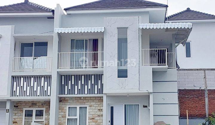 Rumah modern 2 lantai lokasi strategis poros jalan raya karangploso malang  1