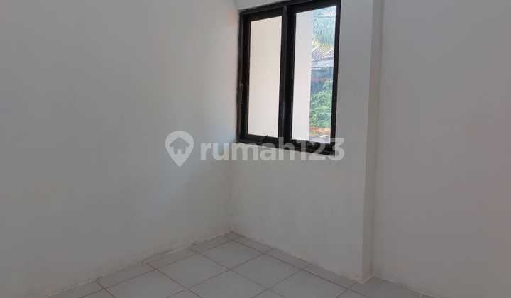 Ready-to-Occupy House in a Large Sawangan Housing Estate, Located Alongside the Main Sawangan Road 2