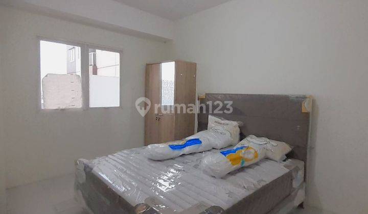 TERMURAH FURNISHED APARTEMEN PUNCAK DHARMAHUSADA LANTAI RENDAH 2