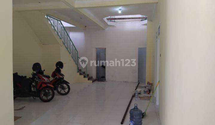 Disewakan Rumah Second model lama sudah renov di area karang empat Surabaya 1