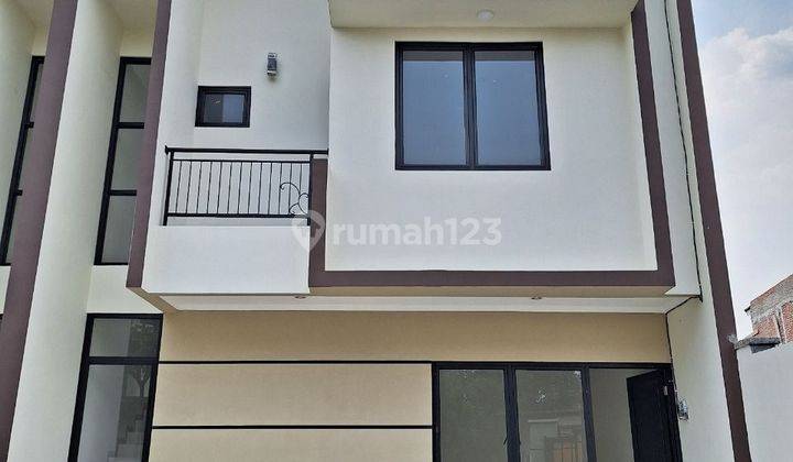Rumah 2 lantai model Skandinavian dekat tol Pamulang 1