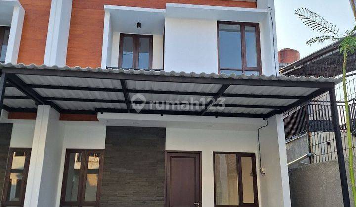 Rumah 2 lantai Cantik Siap Huni Modern Minimalis di pinggir jalan Cinangka  1