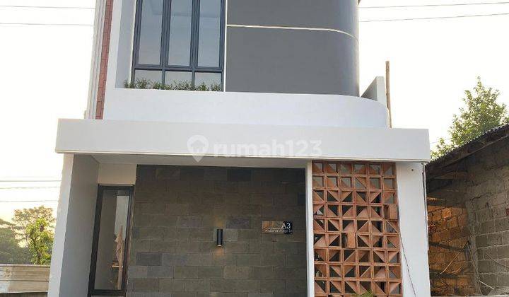 Rumah 2 Lantai Gaya Bali Modern di Cimanggis Depok 1