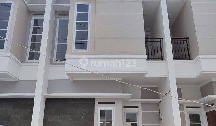 Rumah 2 Lantai Modern di Pamulang Tangerang Selatan, Hanya 900 Jt 1