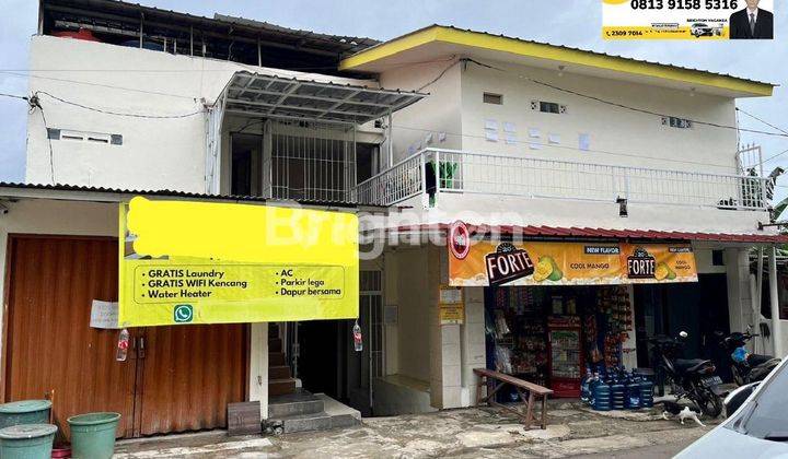 Rumah kos 3lantai bonus 3kios,lb500m2,shm,Ful 100%,Income 45juta perbulan,dekat politeknik UI. 2