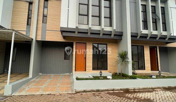 tampak depan rumah 2 lantai siap huni