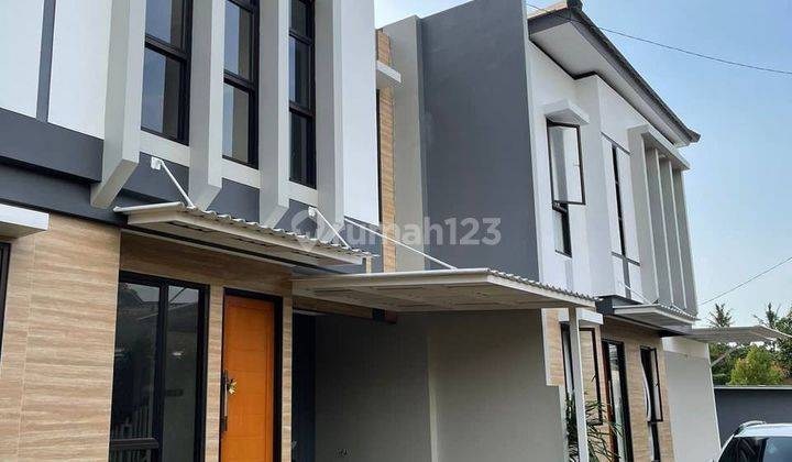 tampak depan rumah 2 lantai siap huni