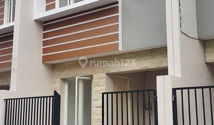 Rumah Regency One Kapas Madya Minimalis Siap Huni Carport 1