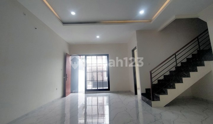 New Minimalist House in Mulyosari Utara, Row for 2 Cars with Smart Doorlock 2