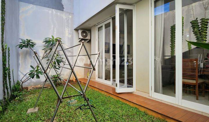Rumah Modern Tropis Semi Furnished Di Setu Cipayung Jakarta Timur 9