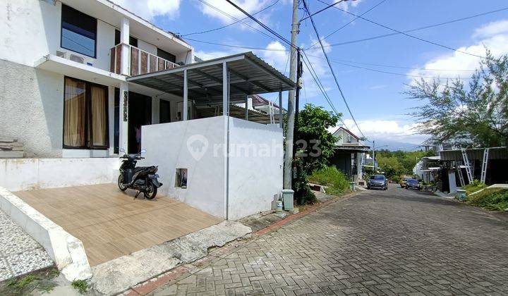 Rumah  Tidar atas Perumahan Bridge town Oz Kota Malang 1