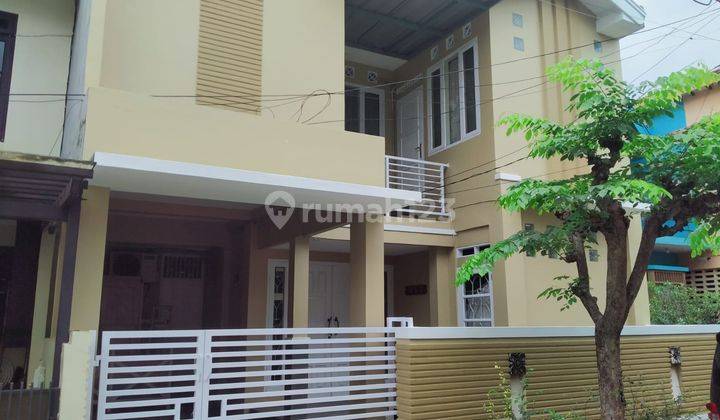 RUMAH CANTIK SEMI MINIMALIS LOKASI OKE 1