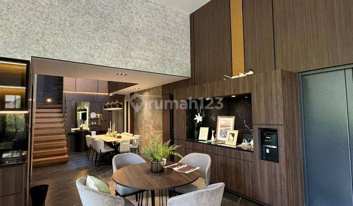 rumah bertema modern tropical di kota baru parahyangan 1