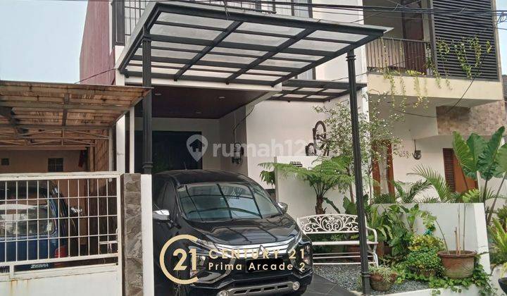 Rumah Kokoh Terawat 2 Lantai di Graha Raya 13203SC 08111899245 1