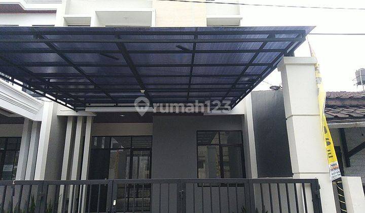 Rumah minimalis modern bangunan baru di turangga 1