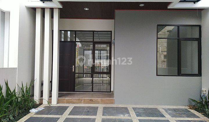 Rumah minimalis modern bangunan baru di turangga 2