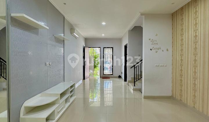 Rumah Full Renovasi dan Semi Furnished di Green Lake City 6X18 Sudah SHM
