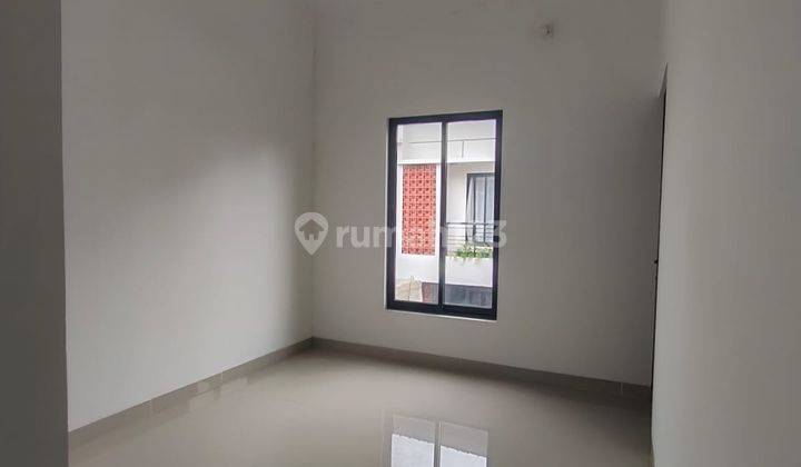 Rumah plus Roof top Harga Nego Dalam Cluster  3menit ke stasiun Lenteng agung  11