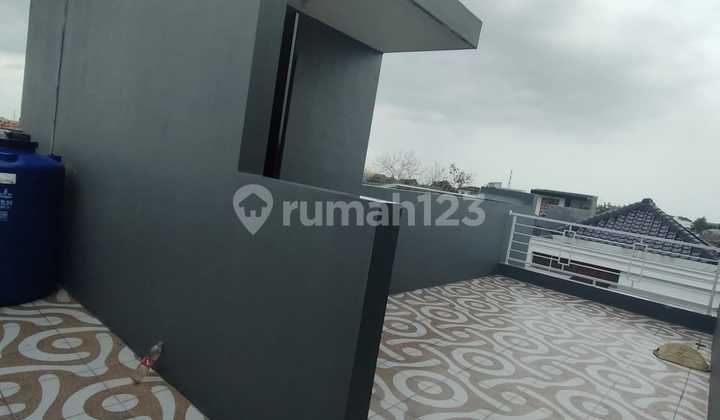 Rumah plus Roof top Harga Nego Dalam Cluster  3menit ke stasiun Lenteng agung  23