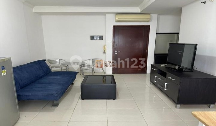 West Jakarta Strategic Residence - For Sale 2 Bedroom Mediterania Garden 2 Furnished, Near Campus & Central Park Mall, 24-Hour Security Facilities, Swimming Pool, Children's Pool, Outdoor Playground, Jogging Track, Basketball Court, Tennis Court, Gym