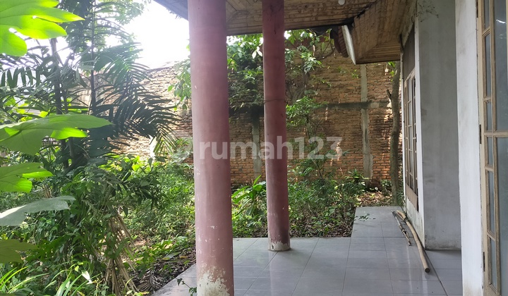 Rumah dipinggir jalan raya  2