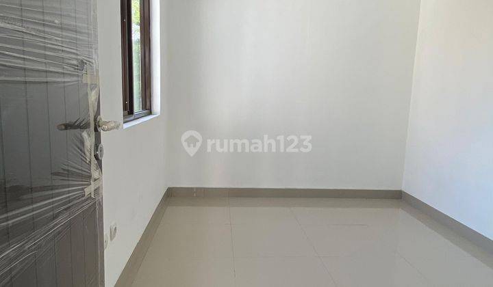 Rumah Modern Minimalis dengan 4 Kamar Tidur Luas Tanah 180m2 2