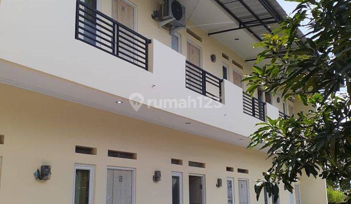 RUMAH KOST 12 PINTU DI KEDAWUNG 1