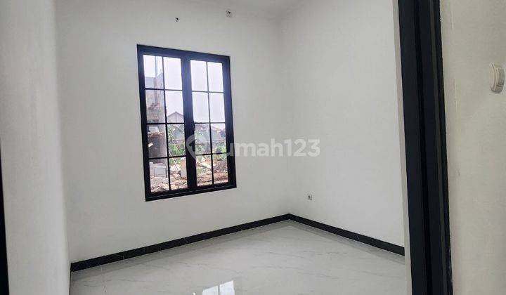 Rumah 2 Lantai Desain Bali di Tanah Baru Beji Depok 2