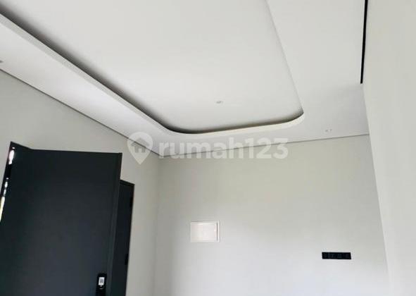 Contemporary Tropical Design House at Icon Cosmo BSD, South Tangerang 2