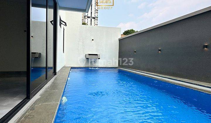 Rumah 3 Lantai Modern Minimalis Ada Pool Carport 2