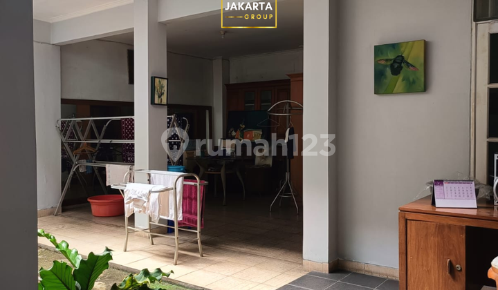 1.5-Story House in Bintaro Jaya, Peaceful & Serene, Includes Garage & Carport 2