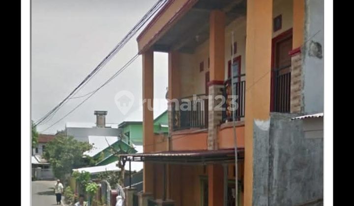 Btn Dewi Kumala Sari Jl. Poros Sangrangan Gor Sudiang, 2-story building, land area 7x14, building area 7x10, 43 bedrooms, 3 bathrooms, 900-watt electricity, PDAM water and bore well, Certificate of Ownership (SHM), 2 air conditioners, 3 aluminum+glass wardrobes, kitchen set.