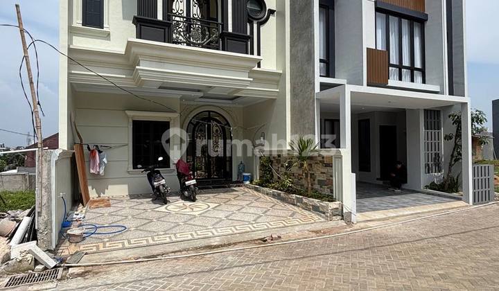 3-Story New House by the Main Road with SHM 2