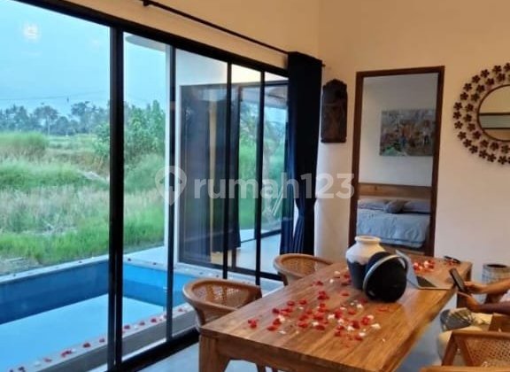 ENGLISH TRANSLATION:
For Rent: Villa with Rice Field View, 10 Minutes from Monkey Forest Center, Ubud, Bali, Indonesia. Strategically Located 40 Minutes from Canggu, Nyanyi Beach, Nuana Beach Club & Resort.
