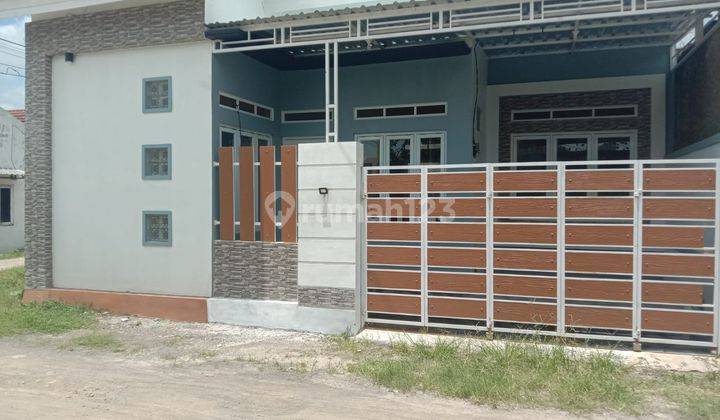 Rumah Bagus di Jl. Raya Penarukan Harjosari Adiwerna Tegal 1