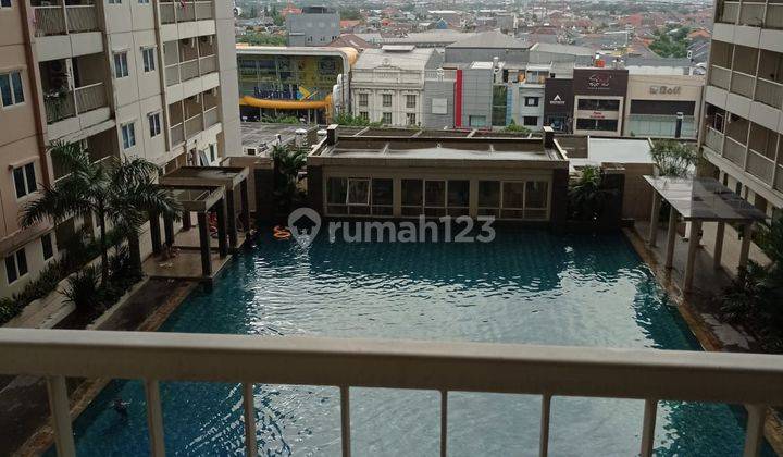 Jual rugi semi furnish Puncak Bukit Golf 2 BR LT 5 view pool 1