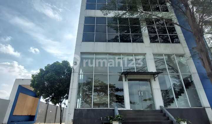 For rent: 4-story building with basement in Harapan Indah, suitable for office, school, clinic, or warehouse.