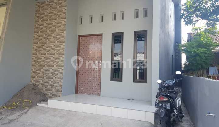 Rumah Bangunan di Tengah Kota 1