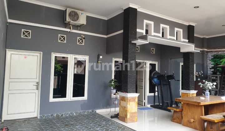 garasi/carport jual rumah siap pakai griya