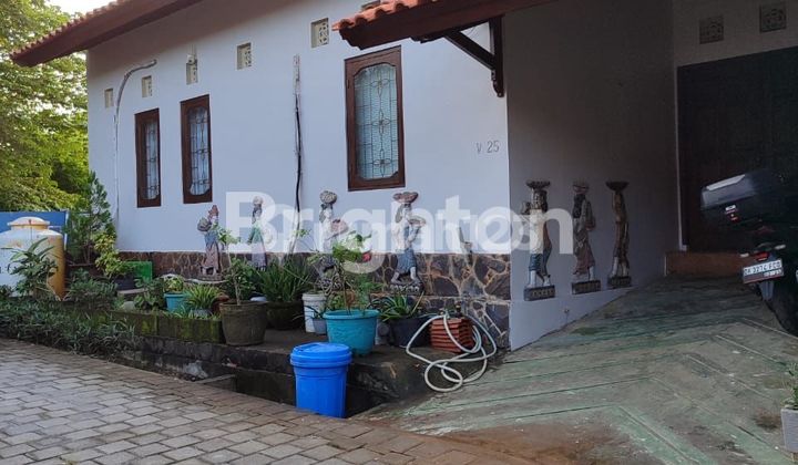 RUMAH DI RAYA KAMPIAL