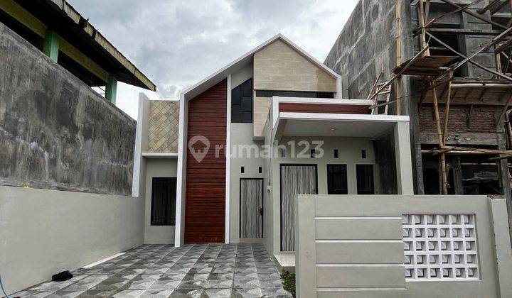 Rumah Mezzanine Scandinavian Gres Baru Siap Huni. Lokasi Tengah Kota Jember 1