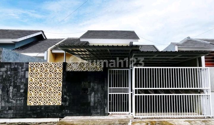 Modern Minimalist House in an Elite Subdivision in the Center of Jember City. Move-in Ready. 1