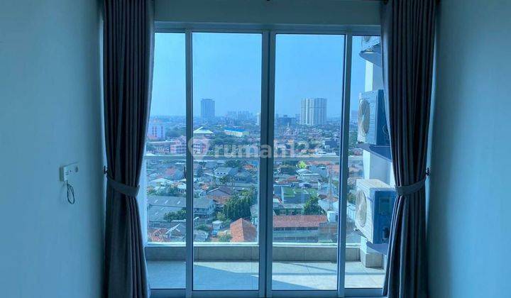 Di Sewakan Apartemen 2BR di Puri Mansion  1